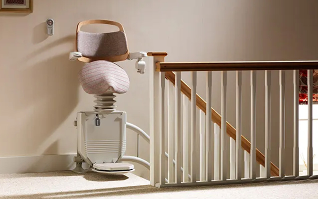 Stannah Curved Stair Lift At Top Of Stairs