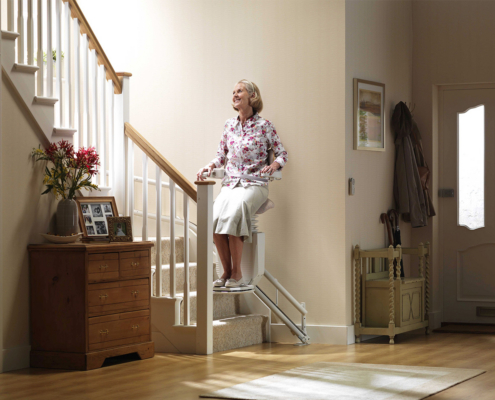 Curved stairlift installed on a multi-level staircase in a Colorado home