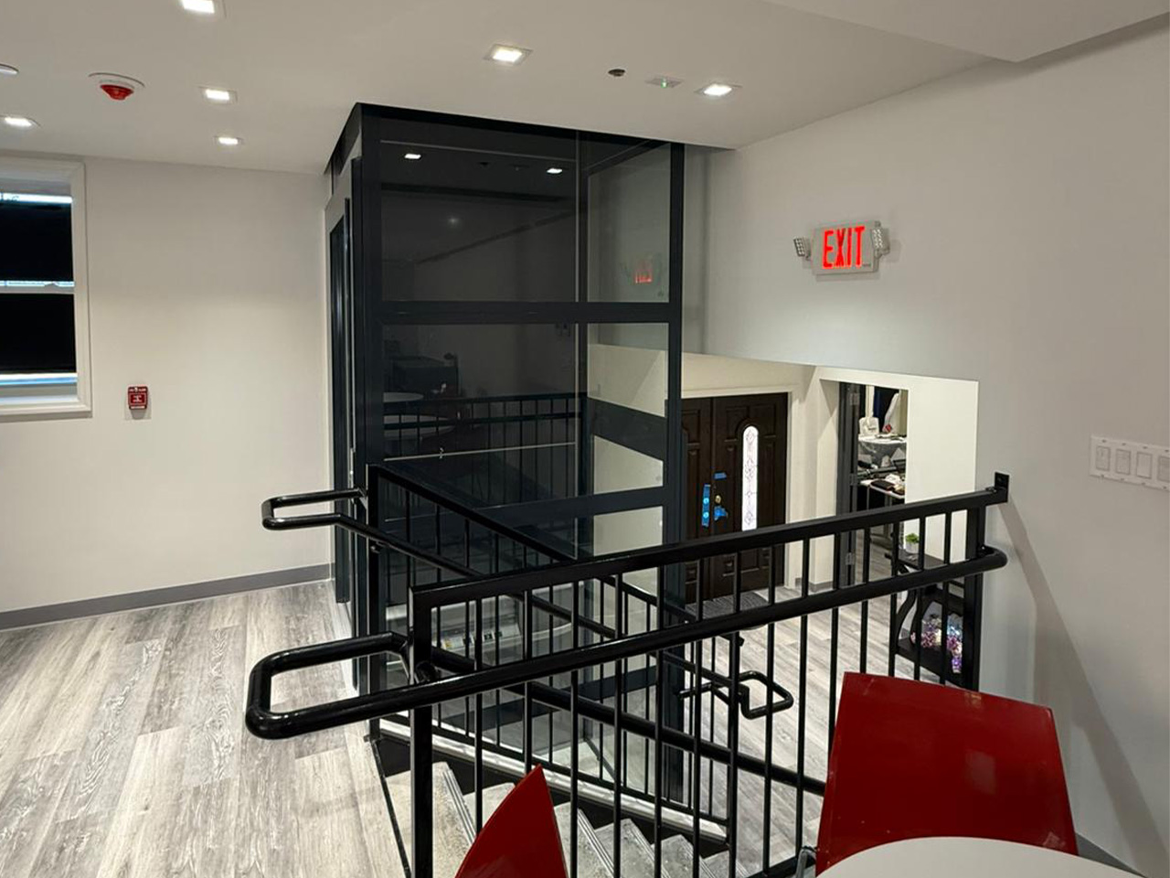 vertical wheelchair lift providing accessibility to a church fellowship hall platforms in Colorado